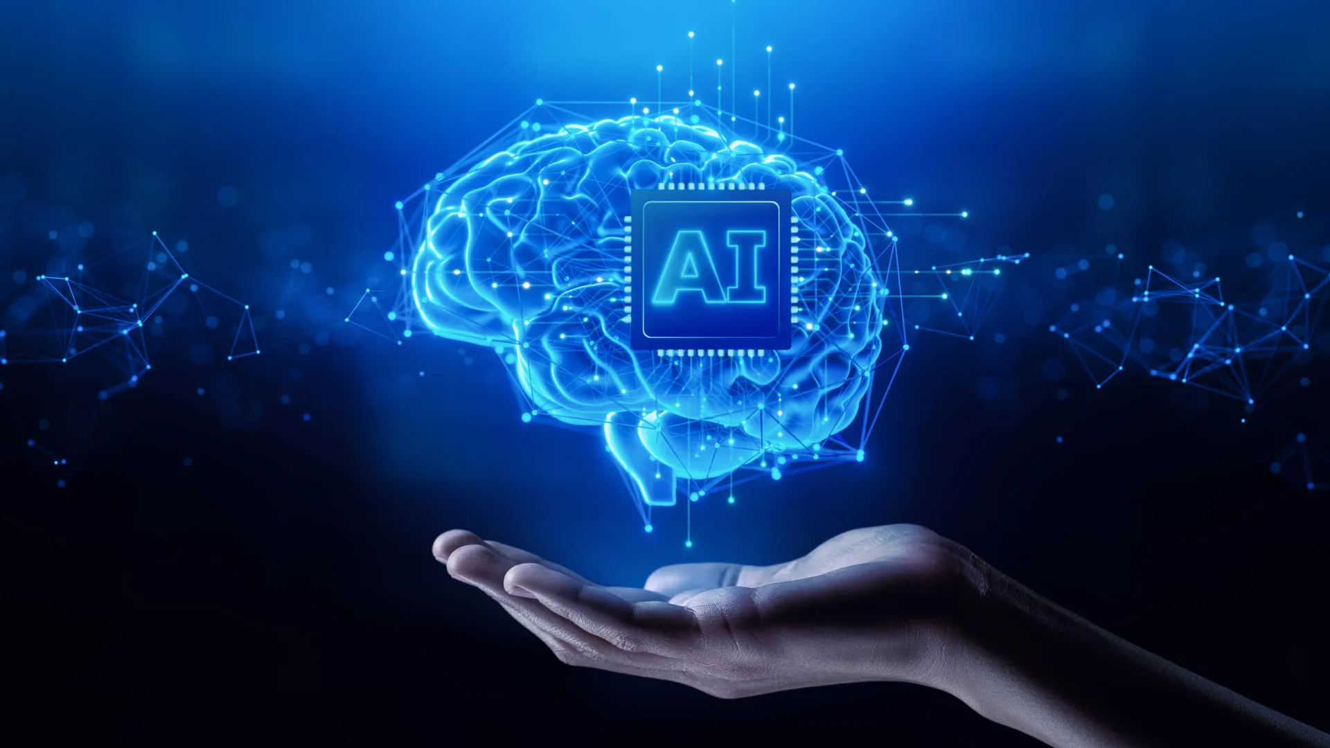 Glowing digital brain above a hand, with a network of connected points